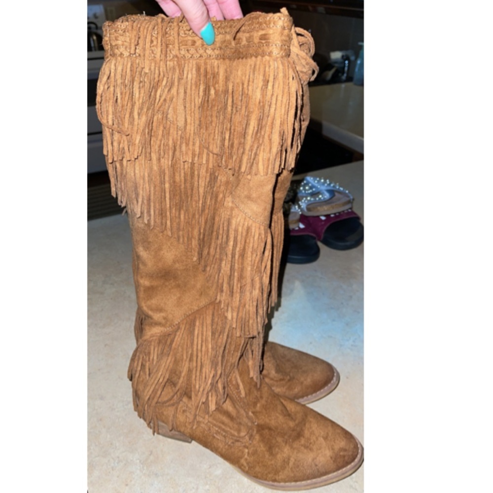 Fringe boots, bought at the buckle